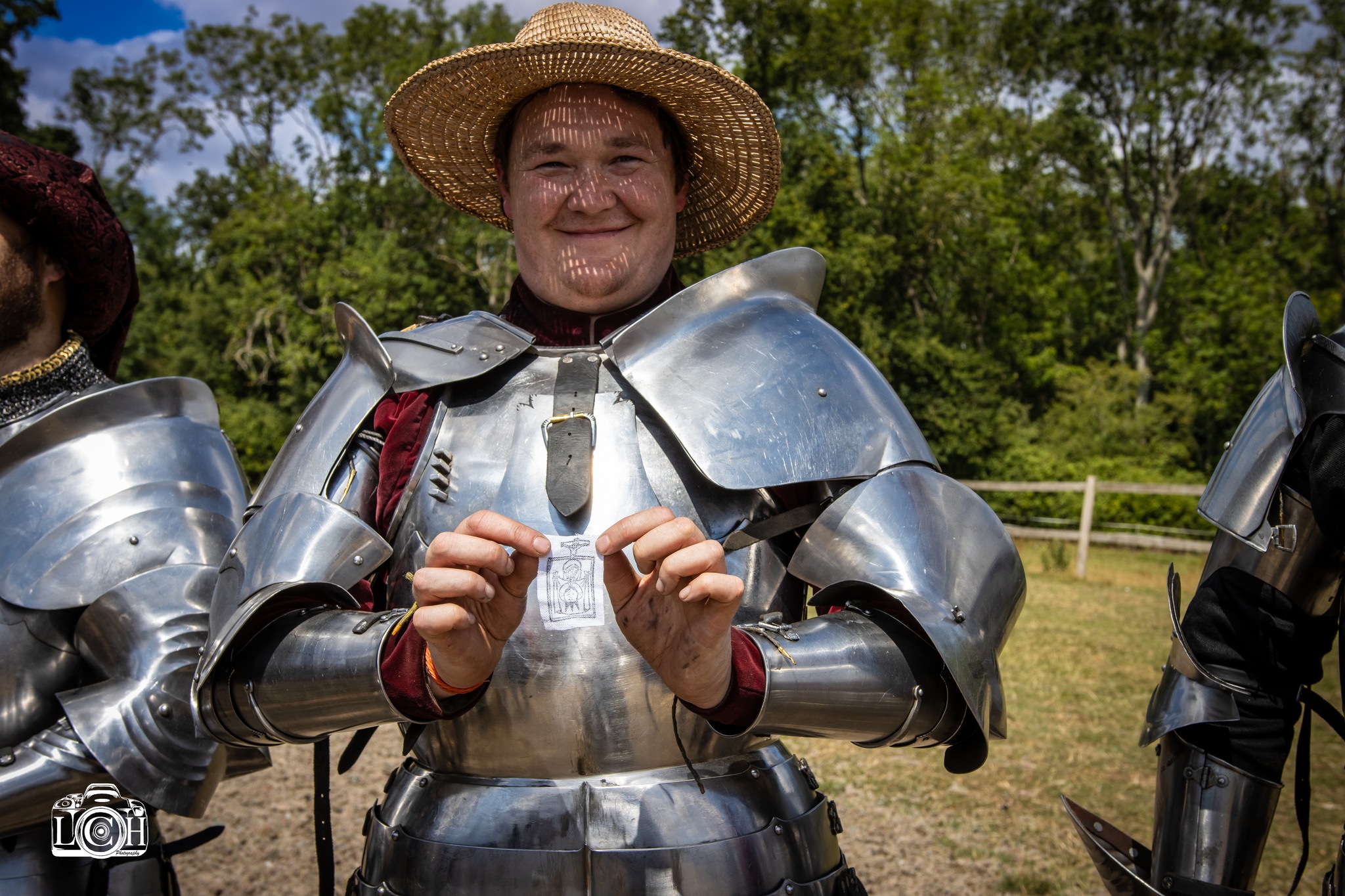 Portrait in armour with straw hat
